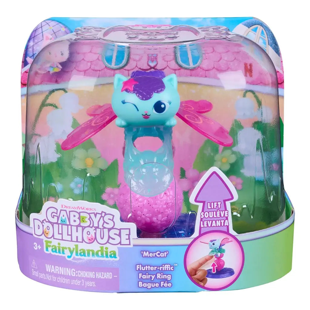 Gabby’s Dollhouse Fairylandia MerCat toy in pastel blue, pink, and purple plastic with clear dome packaging, featuring winged character and stand, designed for imaginative play on a white background.