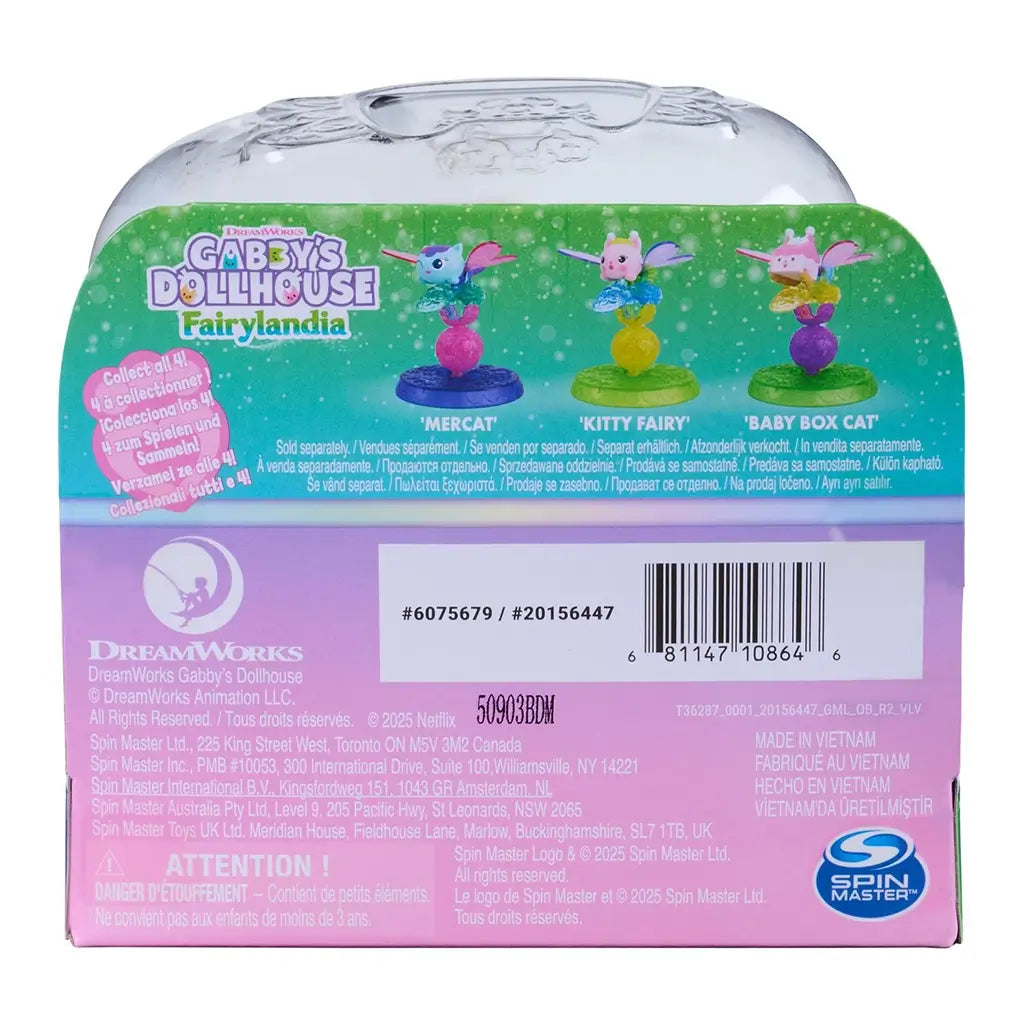Gabby’s Dollhouse Fairylandia packaging in green, pink, and purple cardboard with clear plastic lid, featuring collectible fairy figures and product details, displayed on a clean white background.