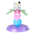 Gabby’s Dollhouse Pandy Paws fairy figure in white, pink, blue, and green glossy plastic with winged design and textured base stand, created for imaginative play, displayed on a white background.