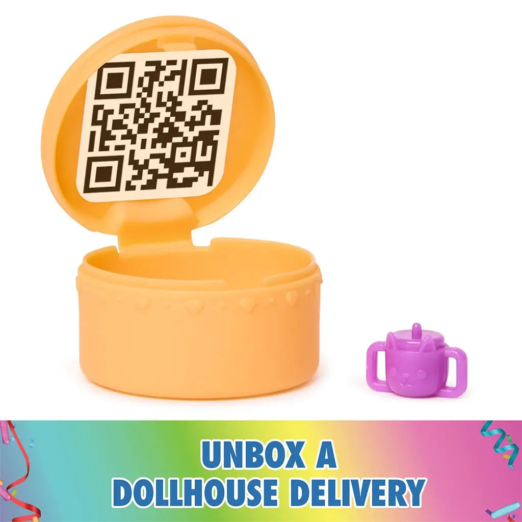 DreamWorks Gabby's Dollhouse dollhouse delivery accessory in smooth orange plastic round container with hinged lid revealing printed QR code and small purple cup beside it.