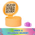 DreamWorks Gabby's Dollhouse dollhouse delivery accessory in smooth orange plastic round container with hinged lid revealing printed QR code and small purple cup beside it.