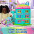 DreamWorks Gabby's Dollhouse Kitty Care Ear Purrfect Playroom in pastel plastic connected to teal cat-shaped dollhouse with rainbow roof, shown in colorful bedroom play setting.