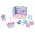 Gabby’s Dollhouse toy set pieces in pastel plastic with smooth textures and rounded shapes, including tub, vanity, figure, and accessories, arranged neatly on a white background.