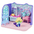 Gabby’s Dollhouse bathroom playset in pastel purple, pink, and blue plastic with glossy finish, featuring tub, vanity, and shelves, themed for imaginative play, arranged on a white background.