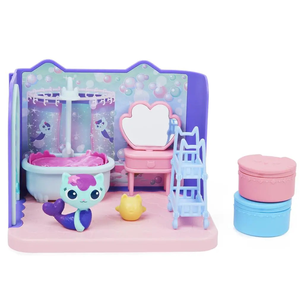 Gabby’s Dollhouse Mercat bathroom playset in pastel pink, purple, and blue plastic with glossy finish, featuring tub, vanity, and figure, designed for imaginative play on a white background.