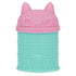 Pink and teal Gabby’s Dollhouse surprise capsule shaped like a cat-topped building with sculpted windows and doors, designed to hold mystery mini figures from the collectible toy series.