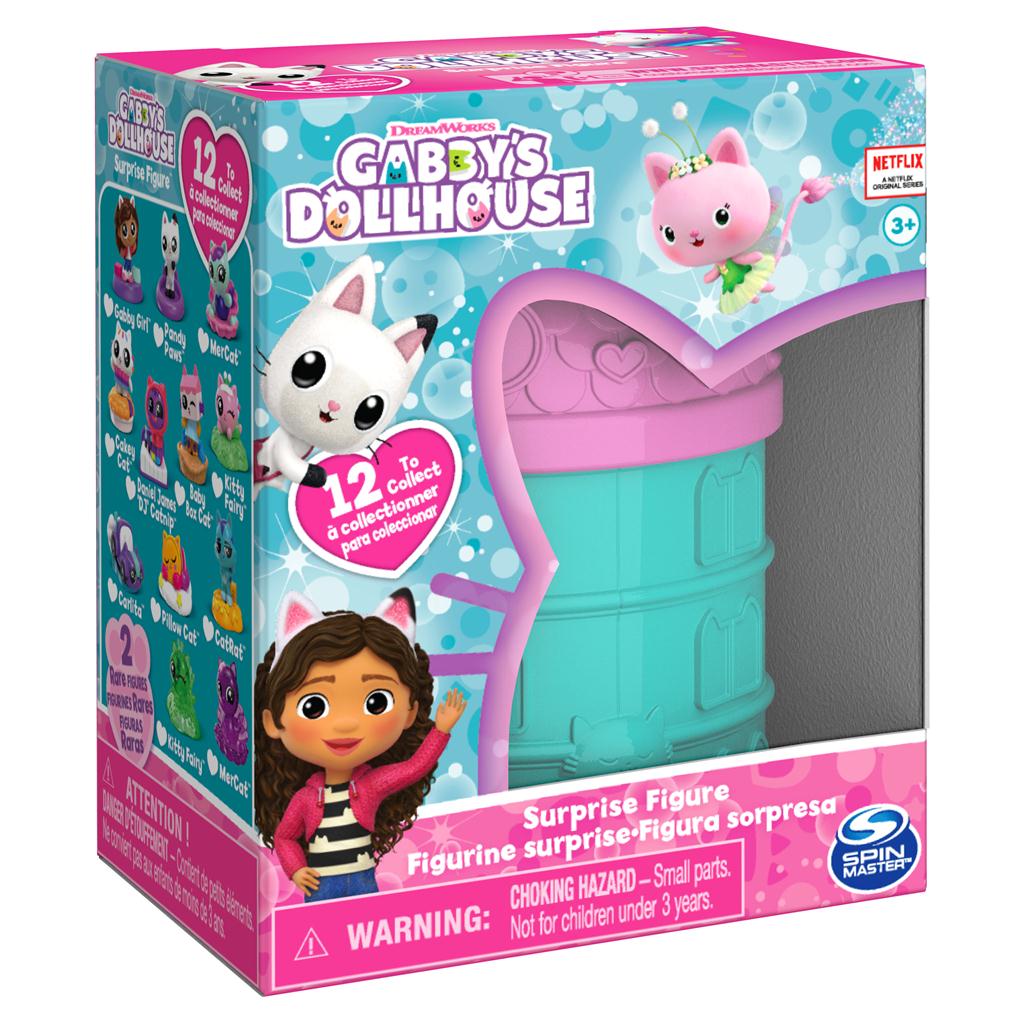 DreamWorks Gabby’s Dollhouse surprise figure toy box featuring colorful branding, a teal and pink cat-shaped capsule, and characters like Gabby and Pandy Paws from the Netflix series.