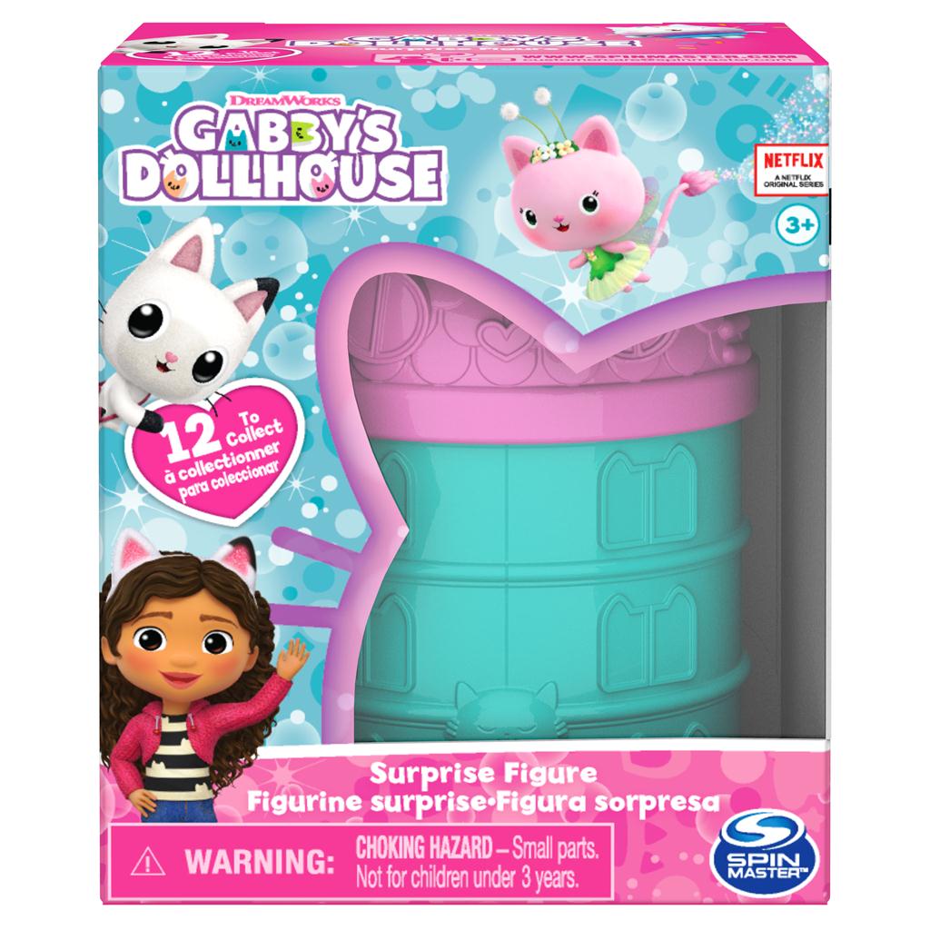 Front view of Gabby’s Dollhouse surprise figure packaging with teal and pink capsule visible through heart-shaped window, DreamWorks and Netflix logos, and collectible character artwork.