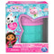 Front view of Gabby’s Dollhouse surprise figure packaging with teal and pink capsule visible through heart-shaped window, DreamWorks and Netflix logos, and collectible character artwork.