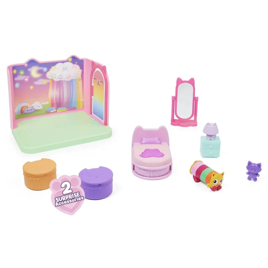 Gabby’s Dollhouse bedroom playset accessories in pastel plastic materials with rounded shapes including bed, mirror, lamp, and figures, neatly arranged on white background to show included pieces clearly.