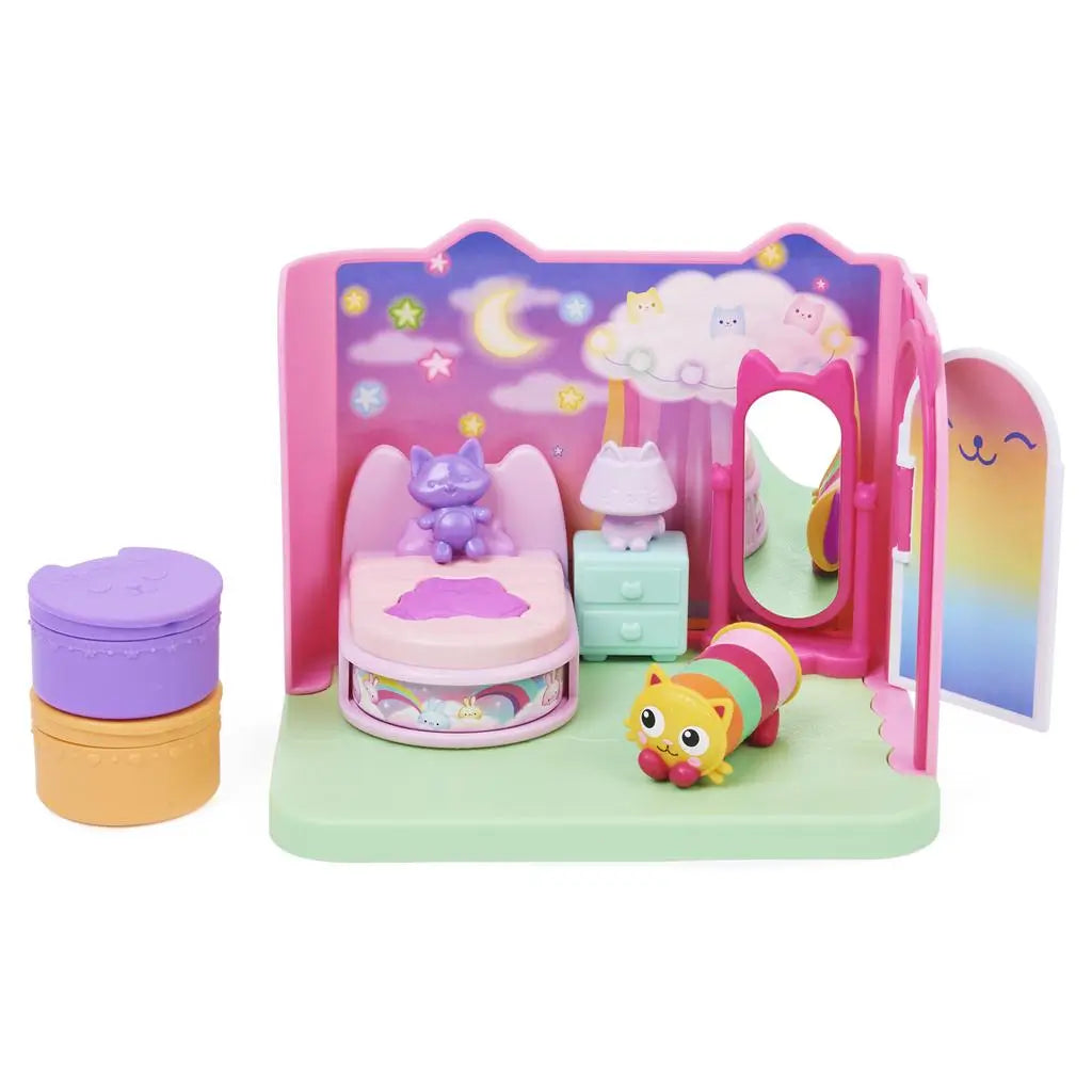 Gabby’s Dollhouse Pillow Cat bedroom playset in pastel pink, purple, and green plastic with smooth rounded furniture shapes, complete mini room scene with bed, mirror, and figures on white background.