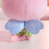 Gabby's Dollhouse Cakey Cat plush toy in pink plush fabric, small rounded kitten shape with stitched features, shown from back with light blue fairy wings detail, highlighting decorative costume design.