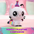 Gabby’s Dollhouse Pandy Paws plush toy white plush cat with smooth texture, black ears and colorful party hat, holding rainbow accessory, designed as playful companion on pastel surface setting.