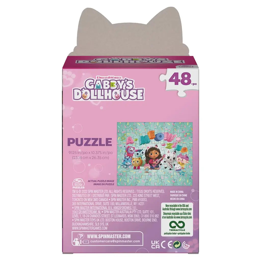 Gabby’s Dollhouse puzzle packaging back in pink cardboard with printed product details, dimensions, and preview image, designed for retail display, shown on a clean white background.