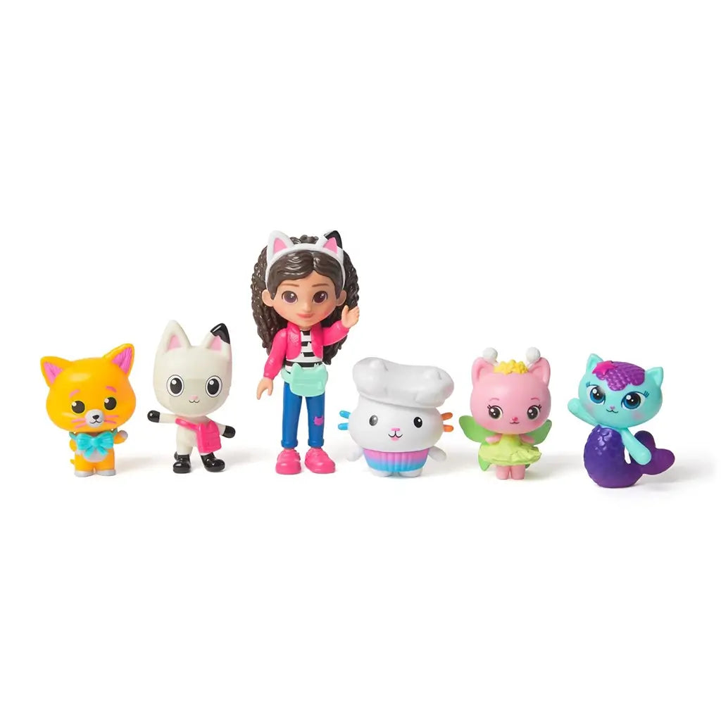 Gabby's Dollhouse The Movie Cat-Venture Crew figures in colorful molded plastic with Gabby doll and cat friends standing upright in a straight line against a white backdrop.