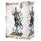 Nagash Warhammer miniature, pale bone-textured undead figure with ornate gold armor and elongated skeletal form, holding a tall staff as translucent green spirit shapes coil upward from the base in a dark fantasy setting.