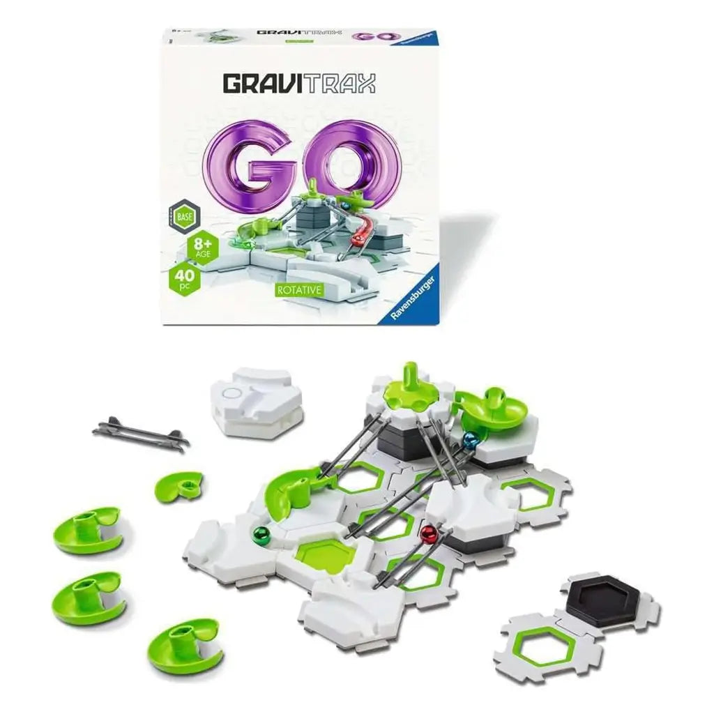 GraviTrax Go Rotative set displayed with open pieces including white hexagonal tiles, green spinners, and silver rails arranged beneath the packaging box.
