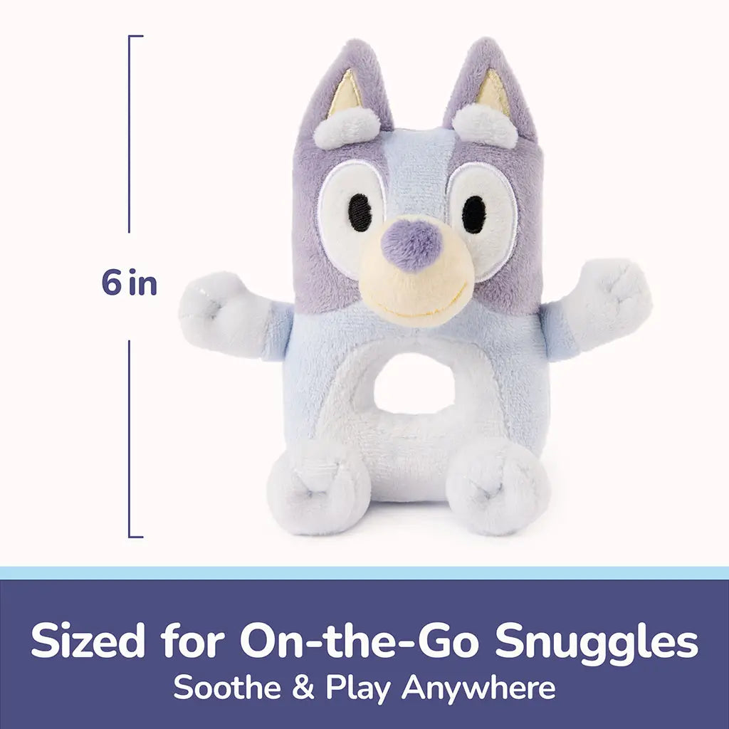 Bluey plush ring rattle is shown with a 6-inch height marker, featuring compact soft construction and rounded form sized for on-the-go soothing and baby-friendly play.