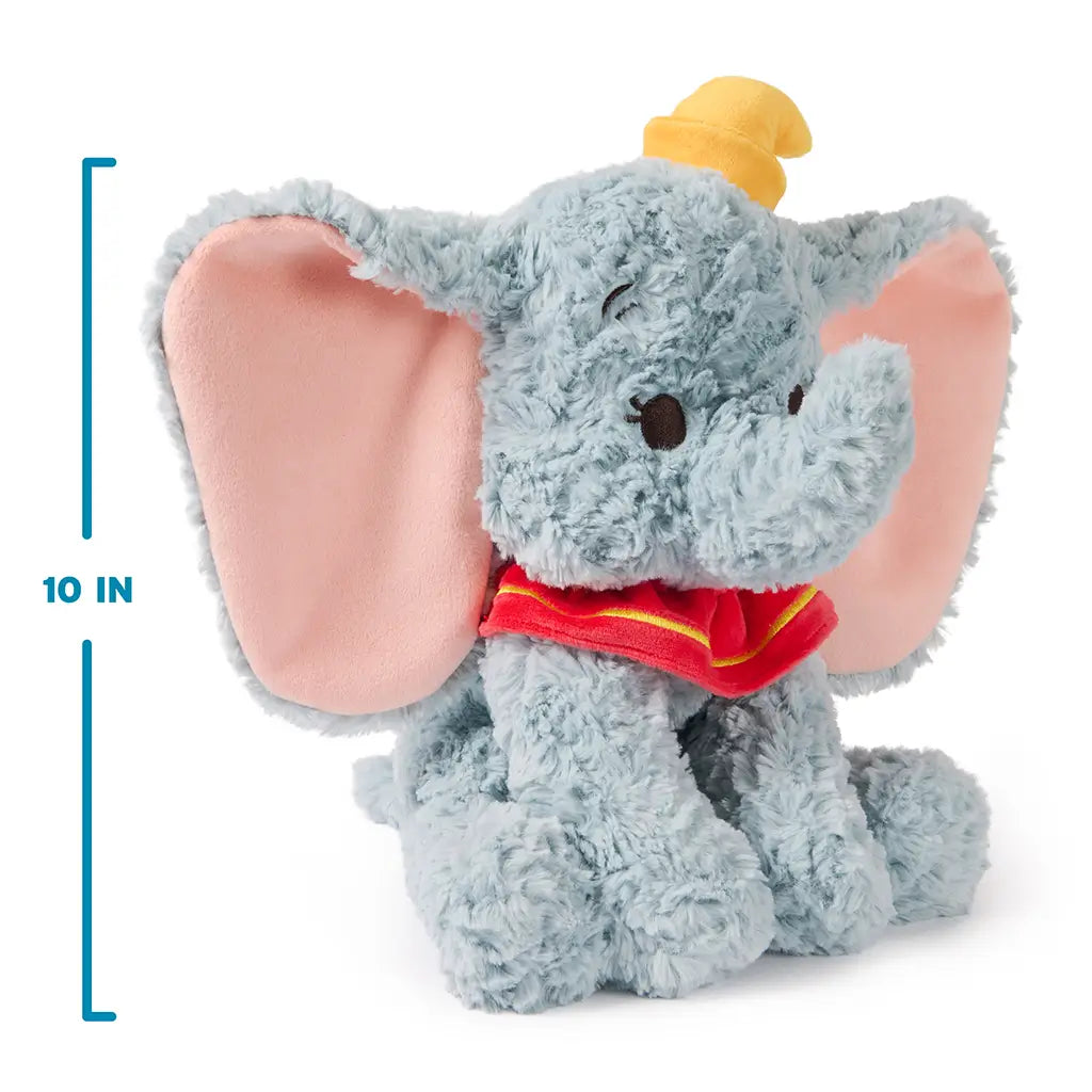 Disney Dumbo plush toy in soft blue with high-pile textured fabric, rounded seated shape, oversized pink ears, yellow hat, and red clown collar, designed as a 10-inch cuddly plush for play, décor, and gifting on a clean white background.