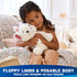 Disney plush toy in white with soft fluffy texture, pink velour ears and bow, rounded kitten body with floppy limbs, designed to be posable and huggable, shown being cuddled by a child in a softly lit bedroom setting.