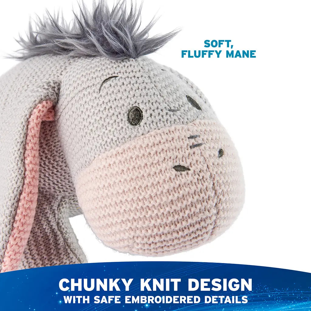 Disney Eeyore plush highlights a chunky knit texture with soft gray yarn, fluffy faux-fur mane, and embroidered facial details, creating a handcrafted look that is safe and comforting for young children.