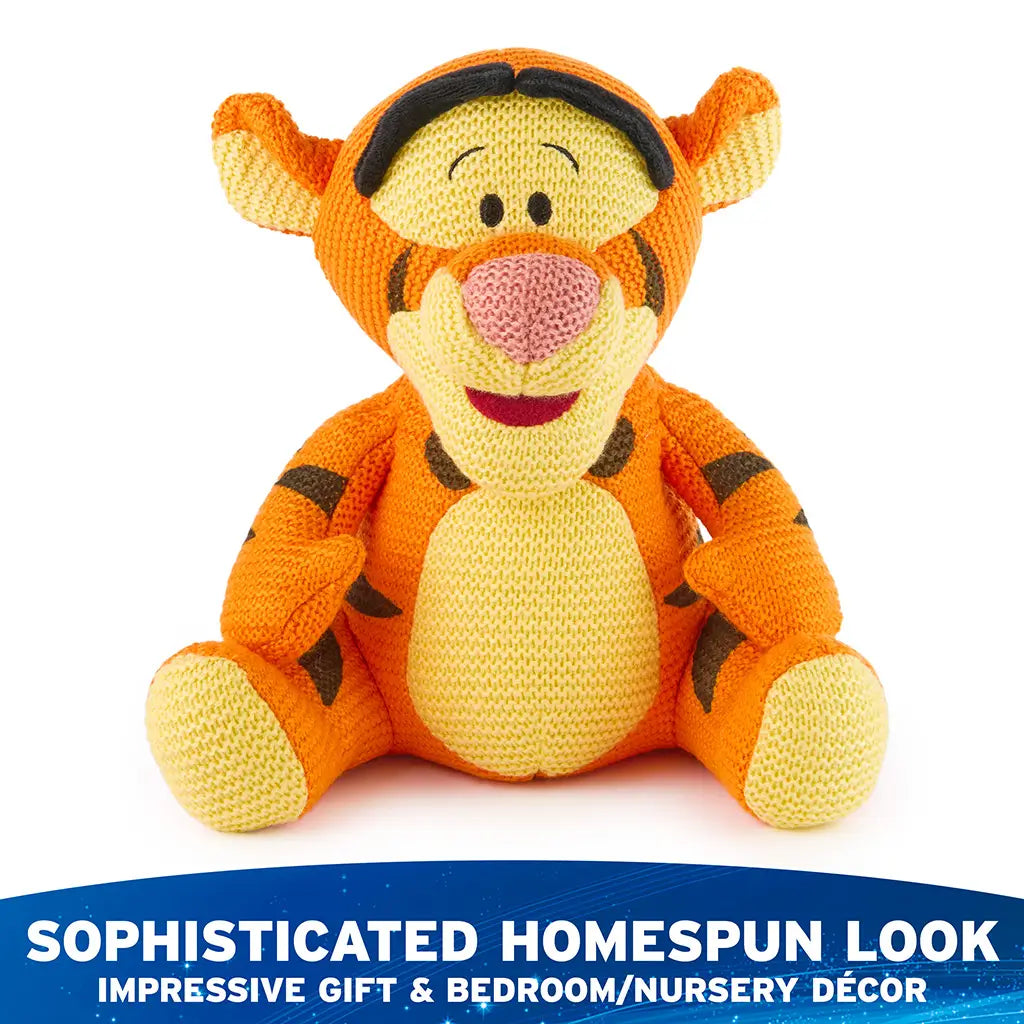 Disney Tigger plush presents a sophisticated homespun look with textured orange knit yarn, soft yellow muzzle and belly, embroidered smile, and relaxed seated posture suited for gifting or display.