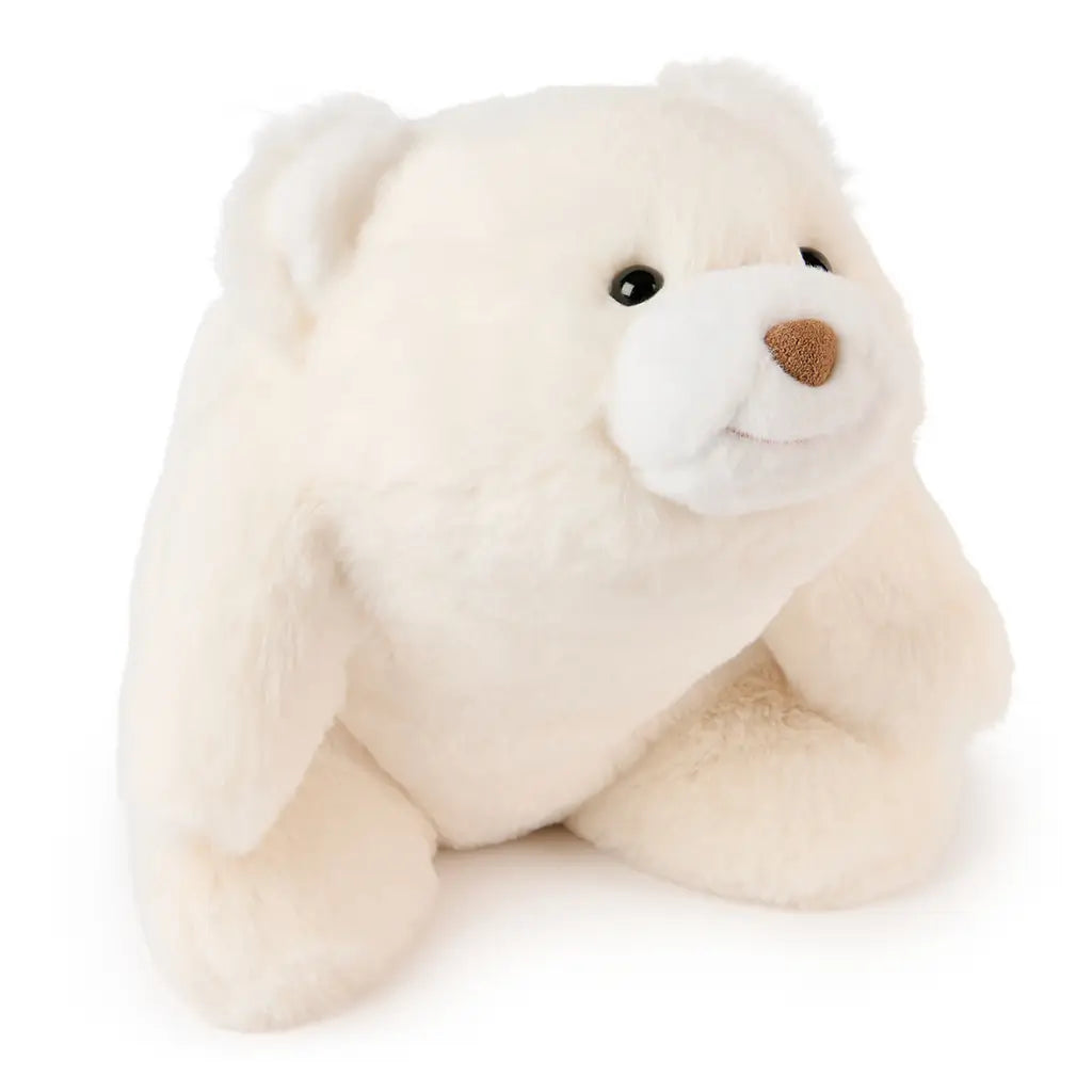 GUND Snuffles teddy bear plush in creamy white polyester fabric with a rounded under-stuffed body, featuring a faux suede brown nose and gentle smile, photographed on a clean white background.