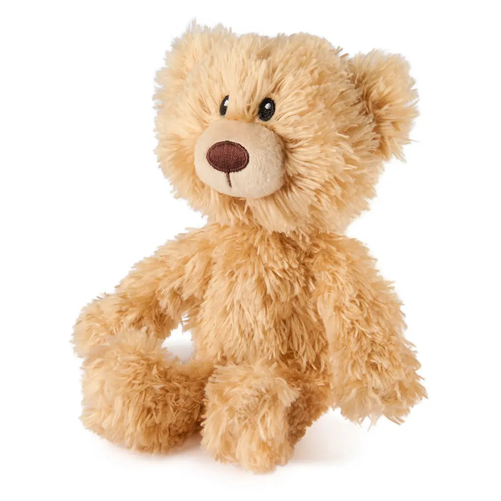 GUND Toothpick plush teddy bear in light tan shaggy fabric with soft rounded body and ears, side angled pose showing texture and stitching, small cuddly toy on a plain white background