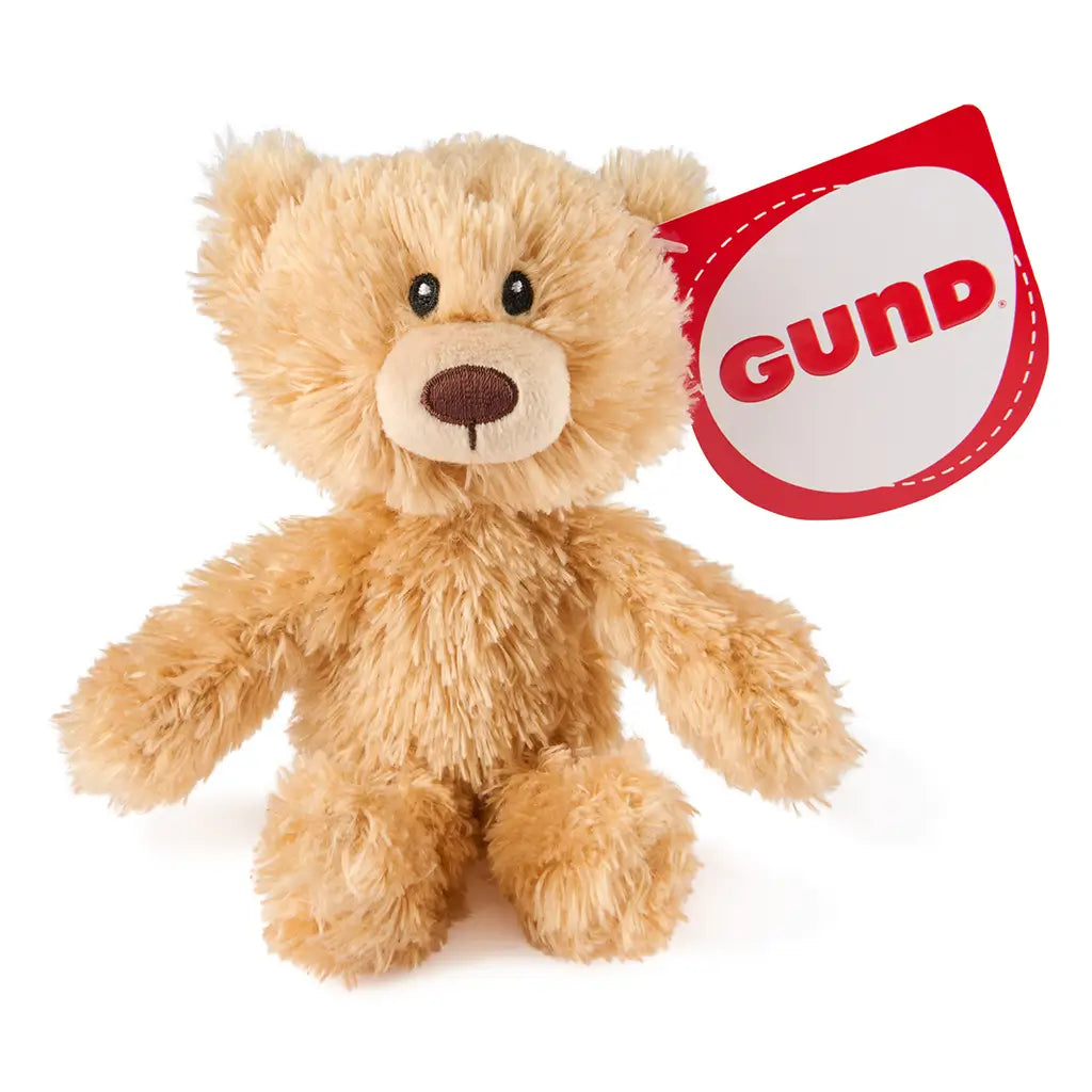 GUND Toothpick plush teddy bear in light tan fuzzy fabric with rounded ears and compact cuddly shape, small soft toy designed for children, isolated on a minimal white background