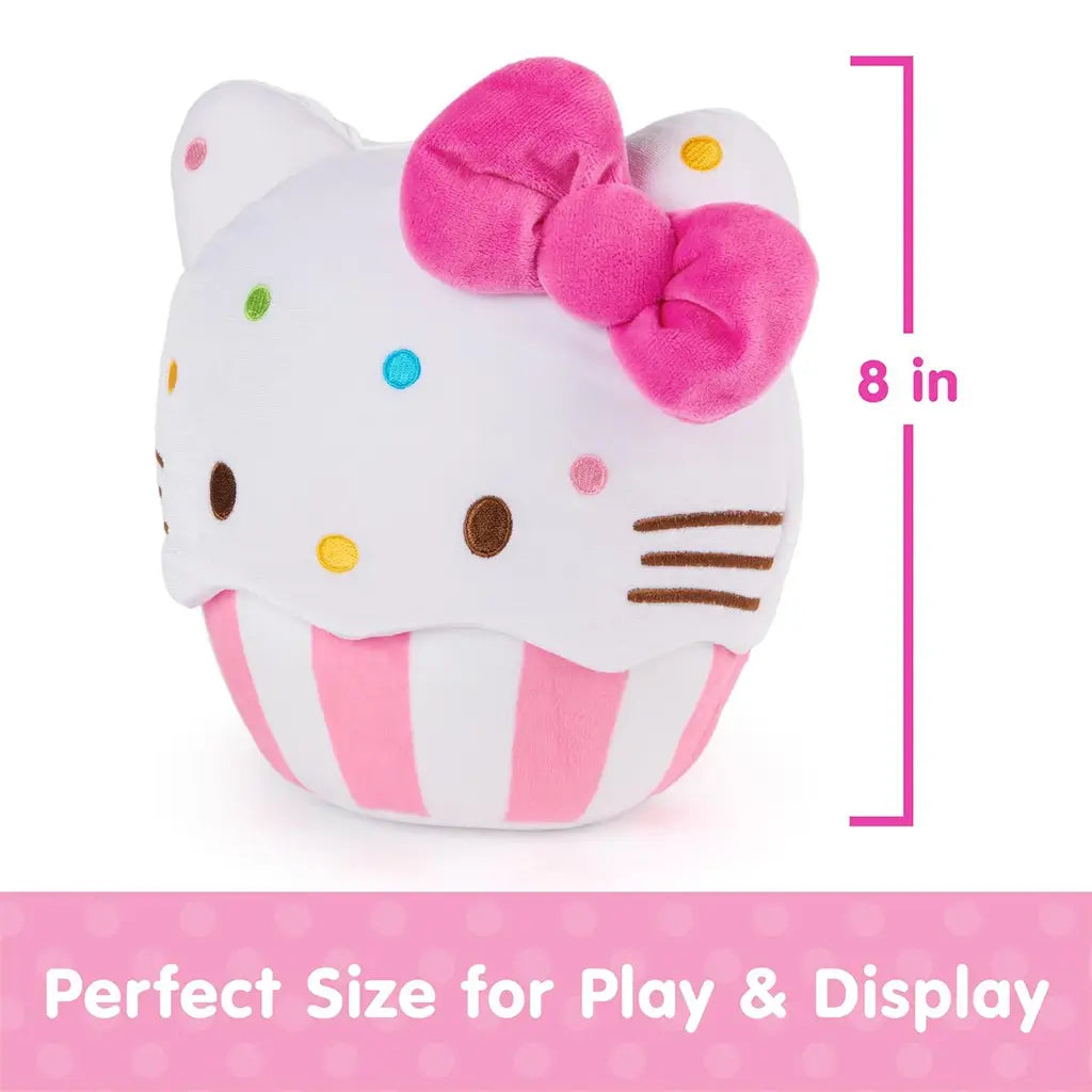 GUND Hello Kitty cupcake plush shown with an 8 inch height measurement graphic, featuring white velour frosting shape, pink striped cupcake base, embroidered facial details, rainbow sprinkles, and proportions sized for play and display.