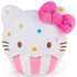 GUND Hello Kitty cupcake plush in white velour fabric with smooth soft texture, rounded cupcake character form, embroidered eyes and whiskers, colorful sprinkle details, pink bow, and striped baking cup base on a white studio background.