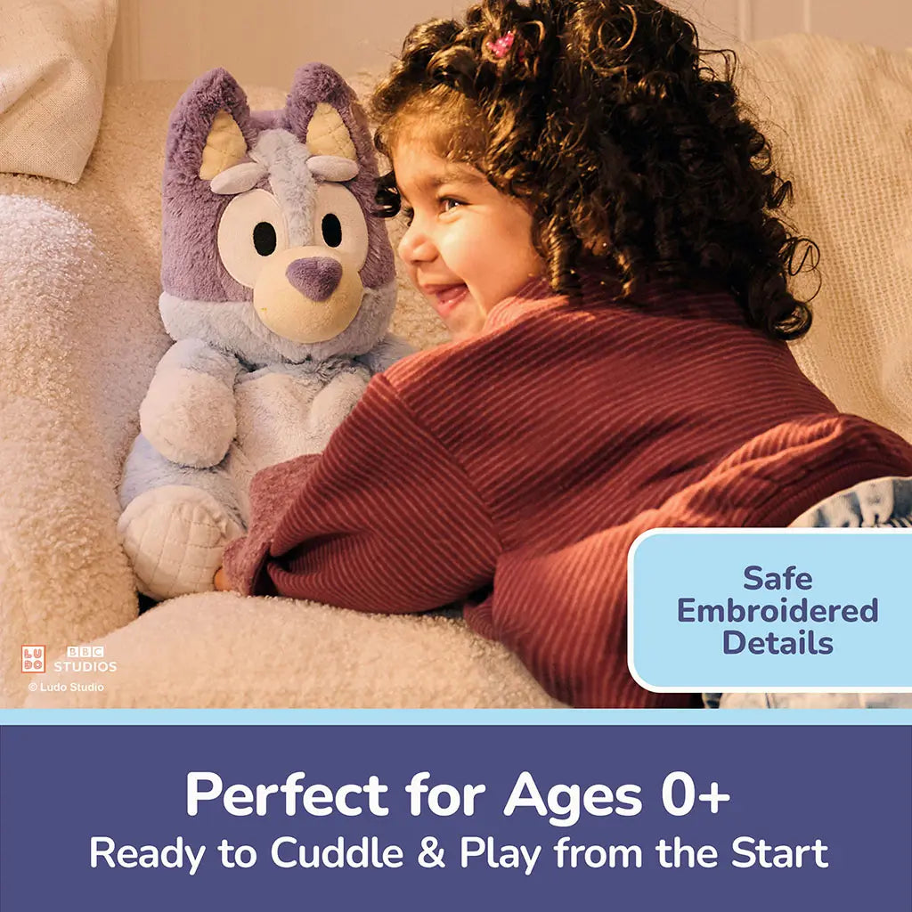 Bluey plush embroidered details highlight stitched eyes, eyebrows, nose, and smile on soft pastel fabric, ensuring baby-safe construction with no hard parts for ages zero and up.