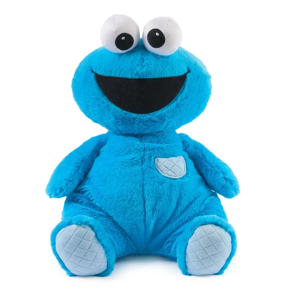 GUND Sesame Street Cookie Monster plush toy made from ultra-soft blue jersey cotton with quilted foot pads and rounded seated shape, created for snuggling, gifting, and everyday comfort on a white studio background.