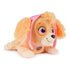 GUND Paw Patrol Skye plush toy in tan, cream, and pink soft fabric with aviator hat and floppy ears, small rounded dog form designed for cuddling on a clean white background