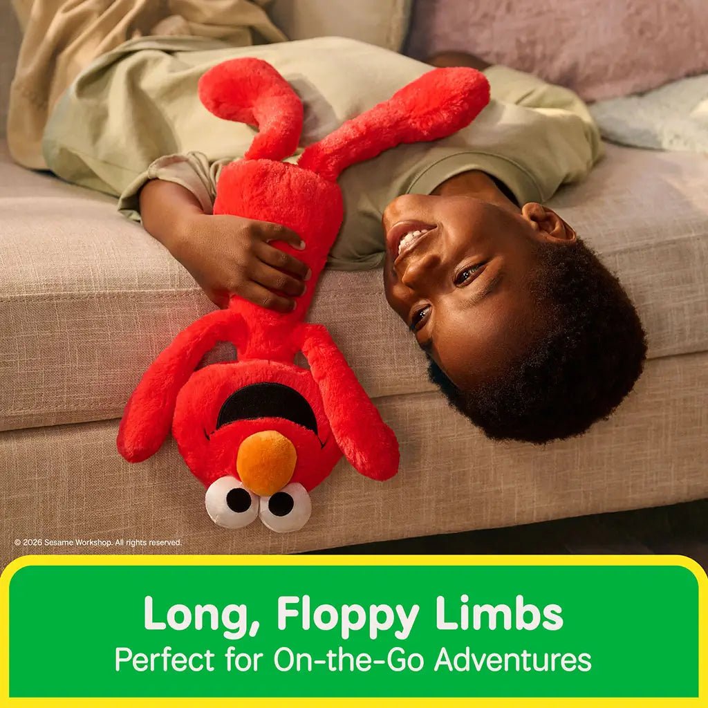Elmo plush toy made of bright red plush fabric has extra-long floppy limbs and a flexible body, allowing kids to grasp, carry, and pose it easily during on-the-go adventures.