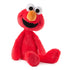 Elmo plush toy presents vivid red fuzzy fabric, rounded head, embroidered eyes and smile, and a seated relaxed form, designed as a classic Sesame Street cuddle toy on a white backdrop.