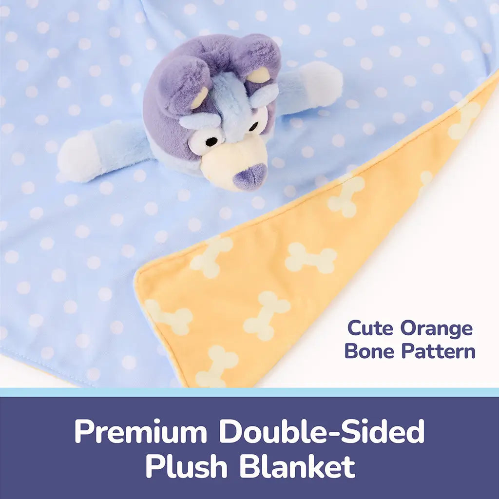 Bluey double-sided plush blanket displays pale blue polka-dot fabric paired with warm orange backing featuring bone patterns, combining a soft textured character head and cozy reversible design for sensory comfort.