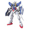 Gundam Exia GN-001 HG 1/144 scale model in blue and white plastic with sharp shoulder armor, green chest GN condenser, red waist accents, holding shield and rifle on a clean white background.
