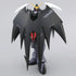 Bandai Gundam Deathscythe Hell articulation view in black matte plastic armor with white and red details, closed cloak-like wings forming a spiked silhouette, standing upright on a base in a neutral white studio.