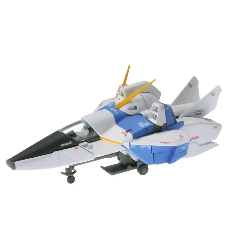 Bandai Victory Gundam model kit in white, blue, and gray plastic with jet aircraft form, featuring cockpit, wings, and landing gear, transforming mecha vehicle posed on a clean white background