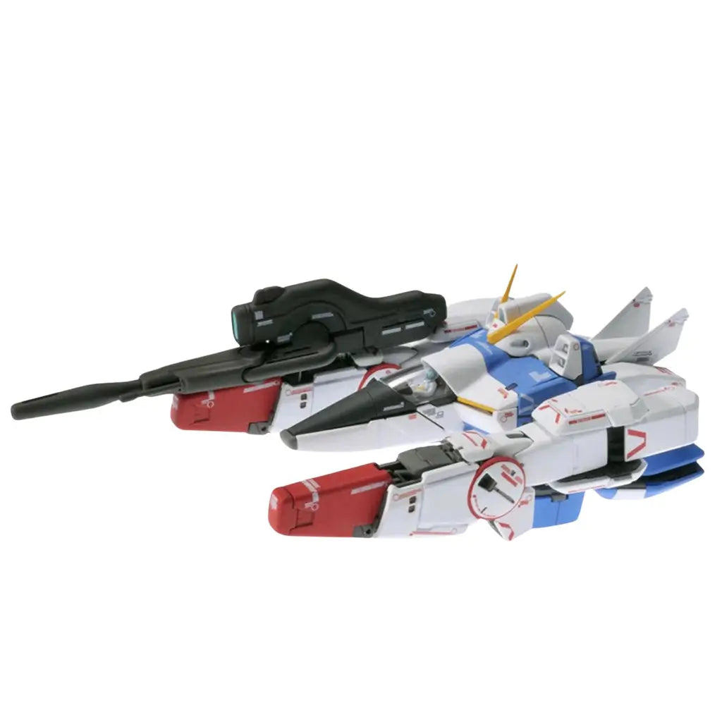 Bandai Victory Gundam model kit in white, blue, red, and yellow plastic with angular mechanical form, shown in fighter jet mode with mounted cannon, transforming mecha figure displayed on a clean white background