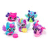 Collection of Hatchimals Alive Neon Rainbow figures in vivid pink, turquoise, blue, and purple hues, featuring wings, textured details, and playful poses on a white background.