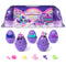 Purple Hatchimals Alive Neon Rainbow egg carton set with glossy plastic eggs, pastel rainbow accents, and playful character theme, displayed as a reusable carton for interactive color hatch play on white.