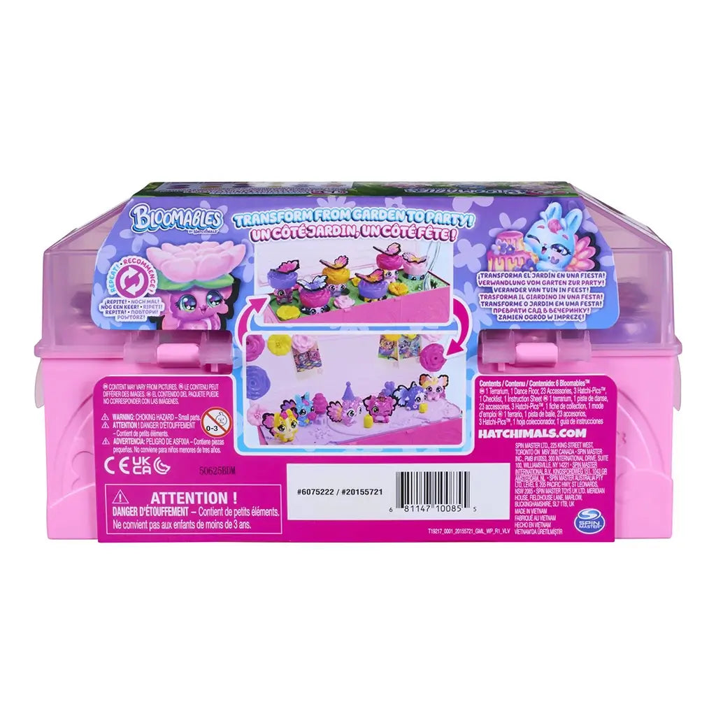 Hatchimals Bloomables Bloom Bash package back showing colorful printed cardboard, illustrated play scenes, feature icons, safety warnings, and multilingual text explaining collectible figures and interactive garden play.