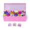 Hatchimals Bloomables Bloom Bash playset opened to reveal pink plastic base, pastel flower decorations, collectible mini figures, and interactive elements arranged to create a whimsical garden party display.