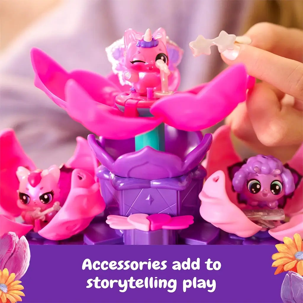 Hatchimals Bloomables Flower Fest accessories close-up showing small plastic star pieces, translucent wings, and decorative elements that attach to characters and stage to enhance imaginative storytelling play.