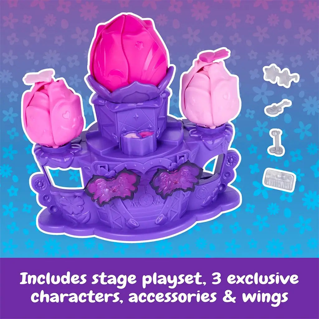 Hatchimals Bloomables Flower Fest contents displayed outside packaging, featuring purple plastic stage, pink and magenta flower buds, three collectible characters, translucent wings, and small accessories on a white background.