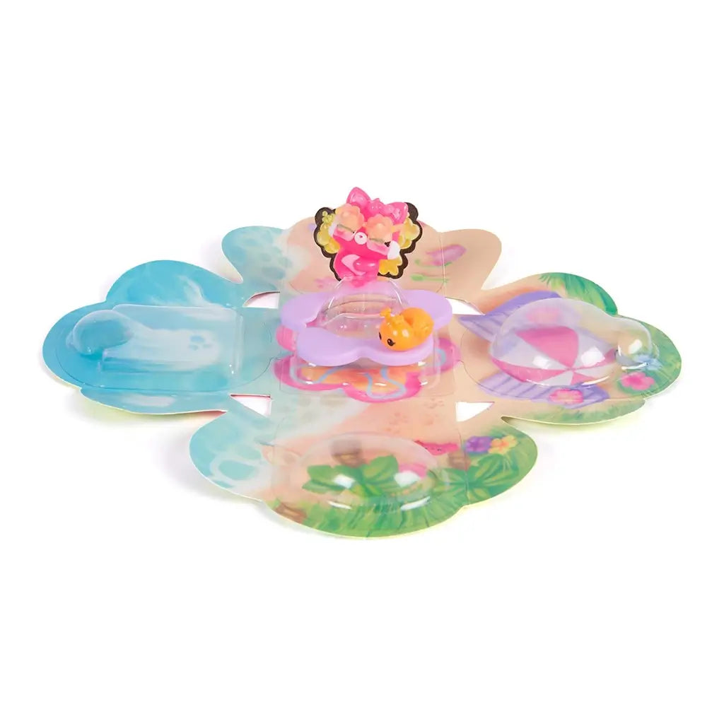 Hatchimals Bloomables surprise blind box opened to reveal colorful fold-out floral play area with printed scenery, small collectible figures, and interactive display elements for imaginative play.