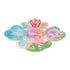 Hatchimals Bloomables surprise blind box opened to reveal colorful fold-out floral play area with printed scenery, small collectible figures, and interactive display elements for imaginative play.