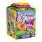 Hatchimals Bloomables surprise blind box package featuring green and yellow cardboard box with flower-shaped top, colorful character artwork, Bloomables branding, age 4+ label, and jungle-themed illustrations on all sides.